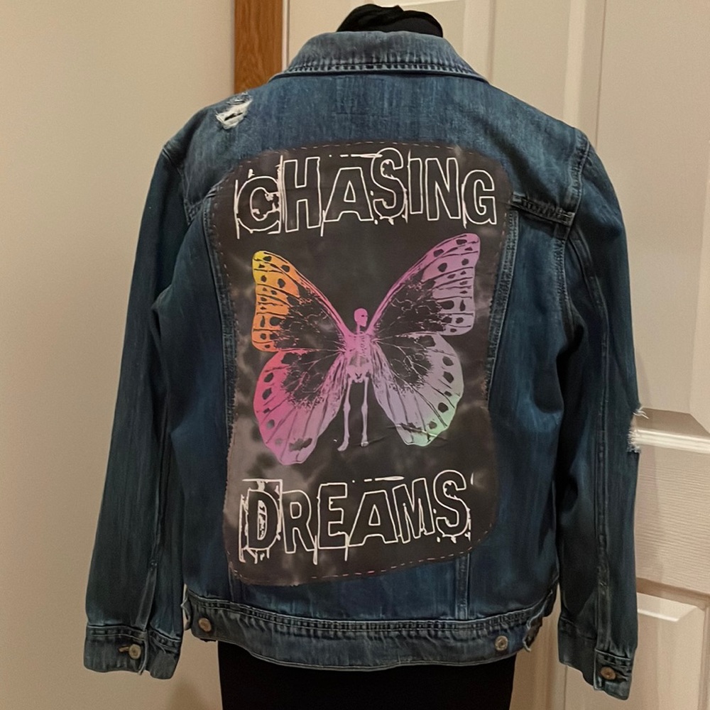 Upcycled denim jacket with Chasing Dreams butterfly skeleton